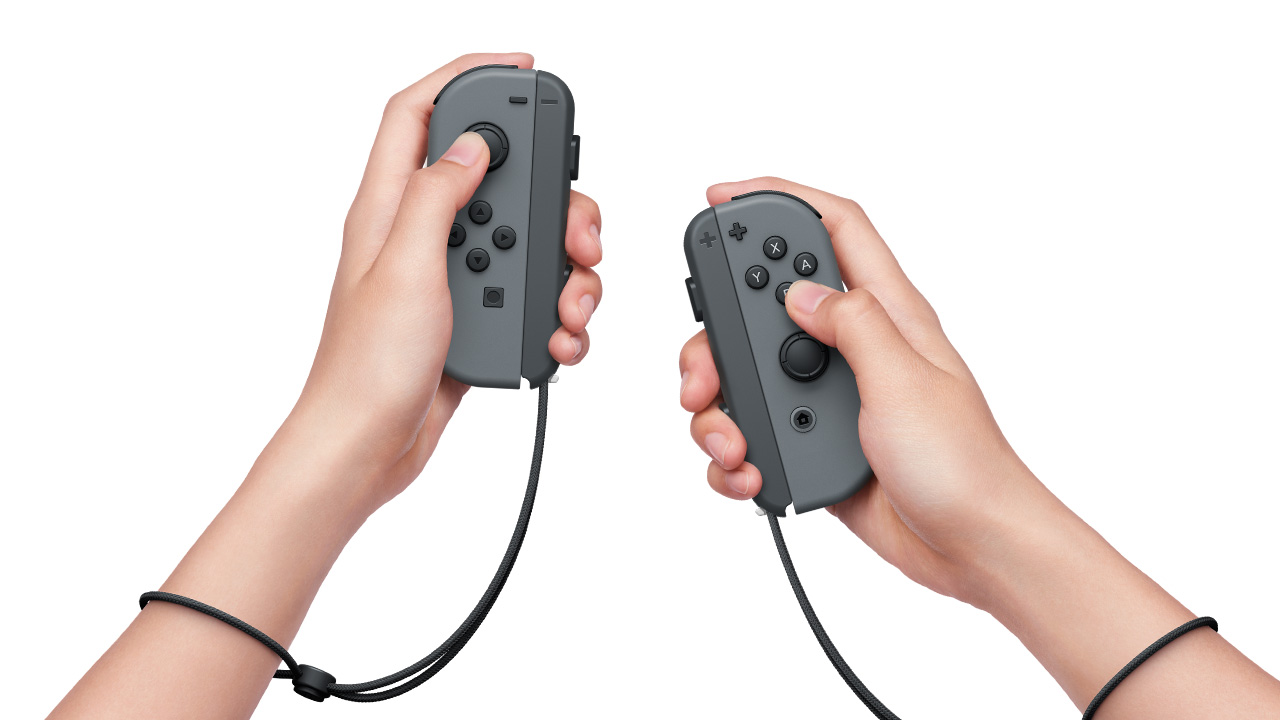 Graphic showing someone holding the joycons in controller mode